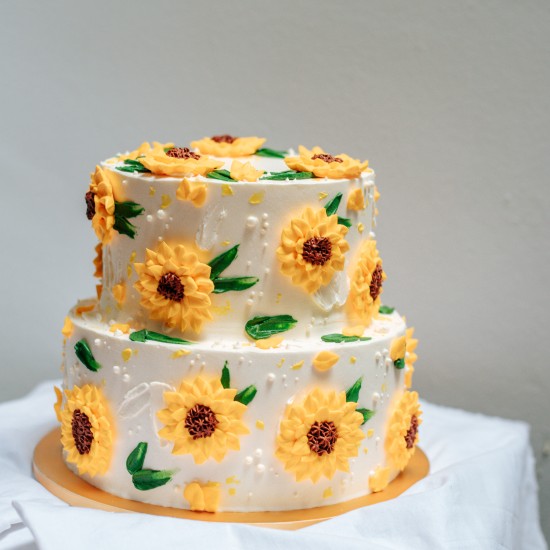 Two Tier Piped Sunflower Cake