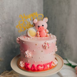 Sprinkle Pink Marble Cake with Pig Topper