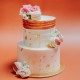 Two Tier Rose Gold & Pink Cake with Florals and Macarons