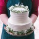 Two Tier White Striped Cake with Rosemary and Baby's Breath